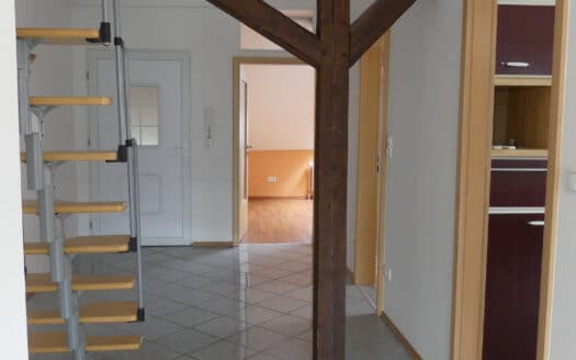 Gepflegte Dachgeschosswohnung mit Einbauküche & Gemeinschaftsgarten